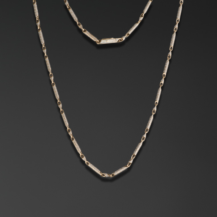 “Engraved designs” (thin)  Chain